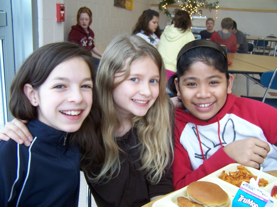 Kids enjoying lunch.